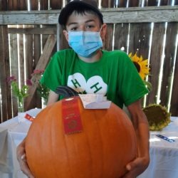 Member with his first prize pumpkin