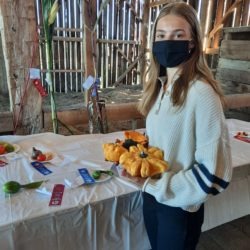 4-H member with her first prize winning gourds
