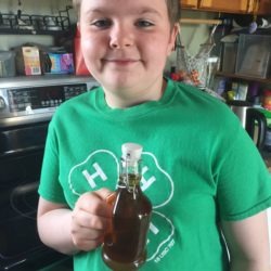 Member with his maple syrup product