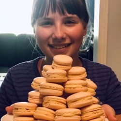 Member with her baked macarons
